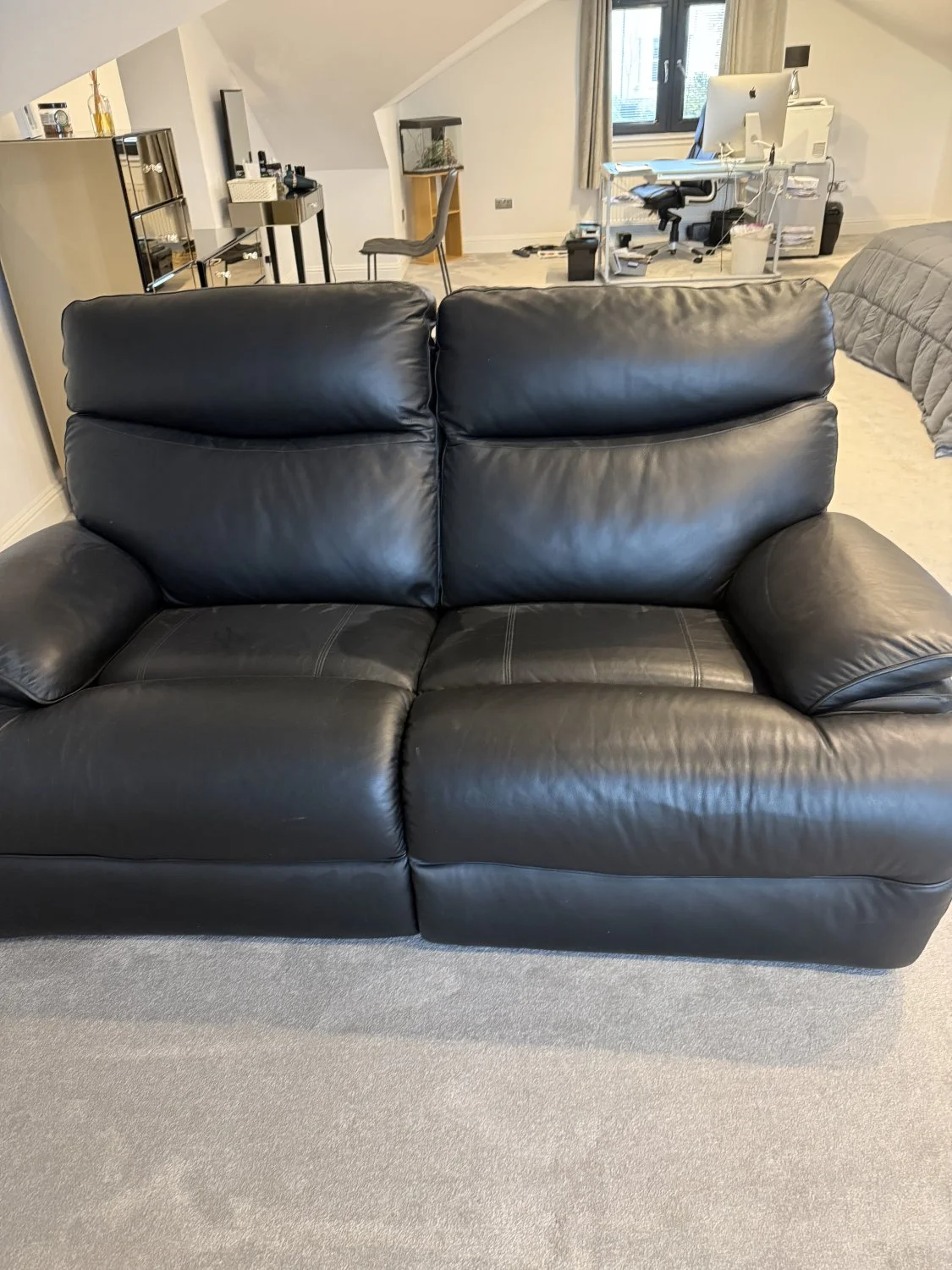 Stylish Black Leather Sofa - Perfect for Modern Living Spaces