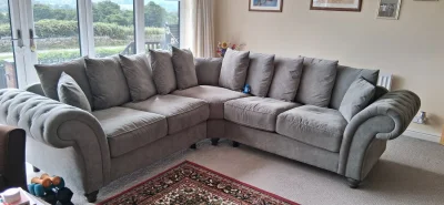 L-shaped fabric corner sofa in soft grey finish
